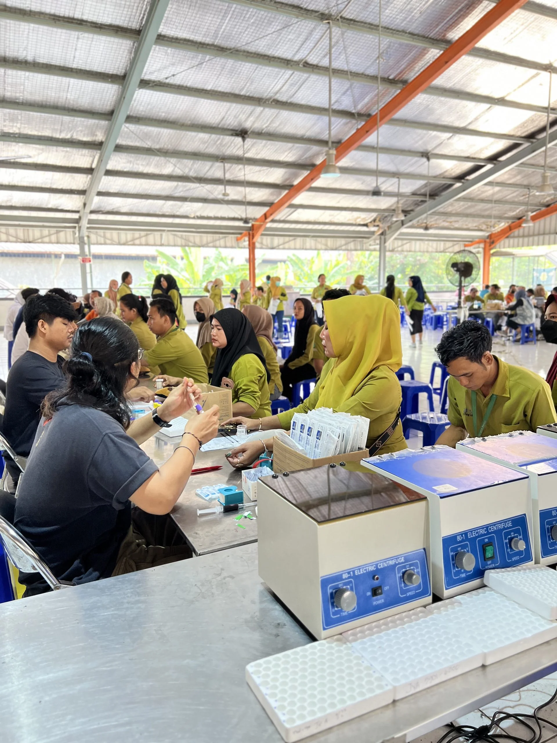 Stasiun pemeriksaan onsite tempat peserta mengantre menuju unit radiologi